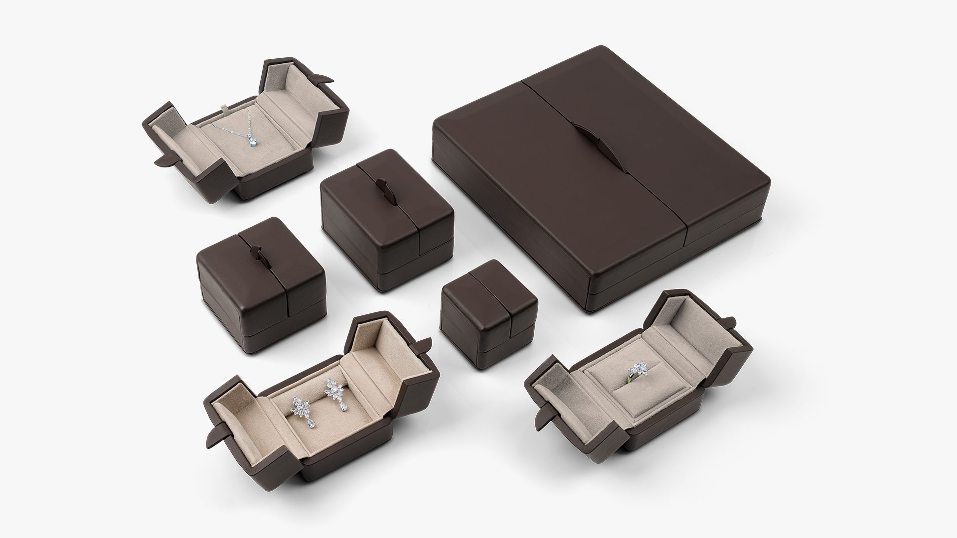 Arrangement der Etuiserie in verschiedenen Ausführungen in der Außenfarbe Terra und Innenfarbe Naturel.