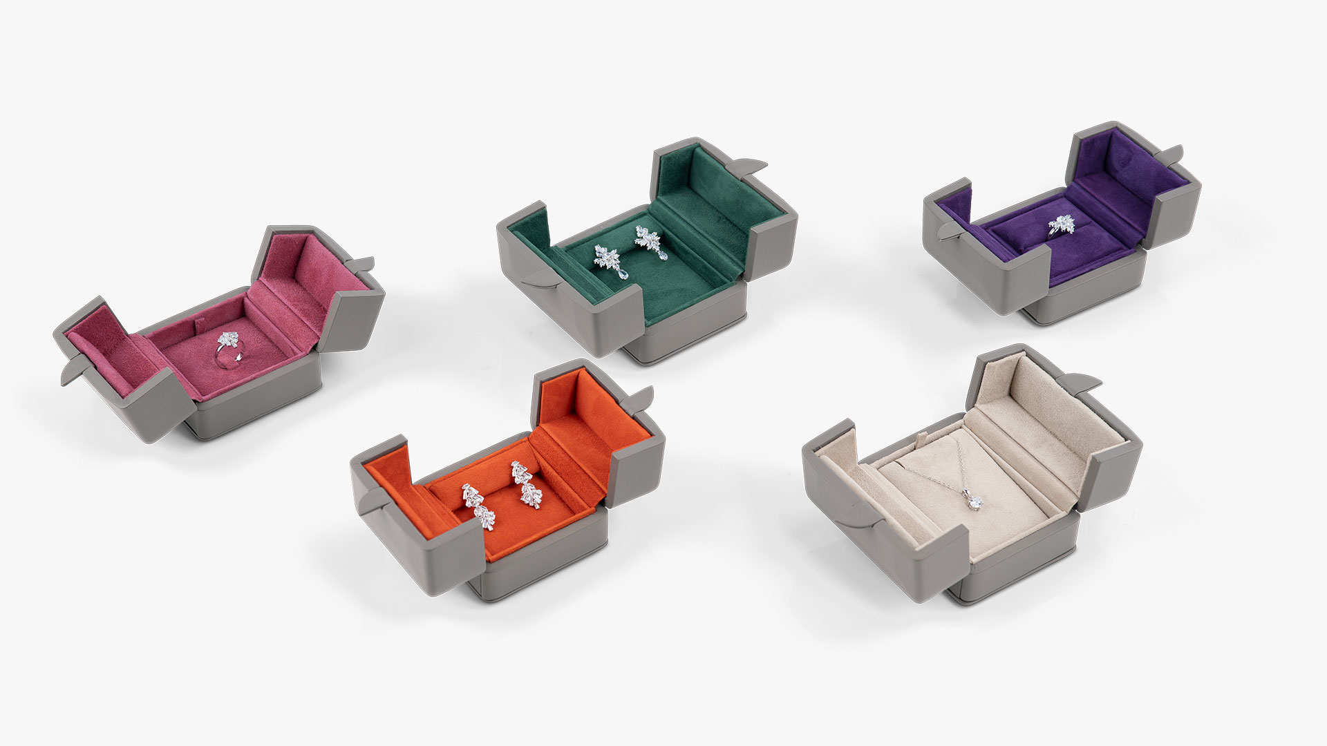 Ring- und Anhänger-Etuis der Etuiserie Versailles in Grey Brown mit verschiedenen Innenfarben.