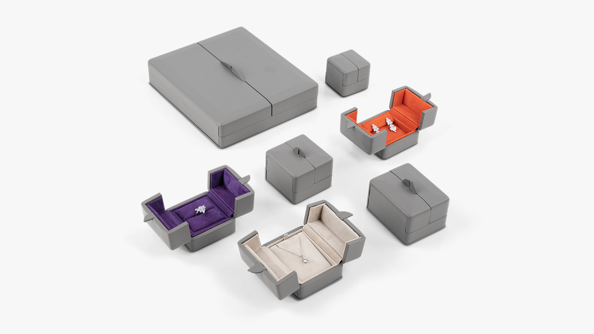 Arrangement der Etuiserie in verschiedenen Ausführungen in der Außenfarbe Grey Brown.