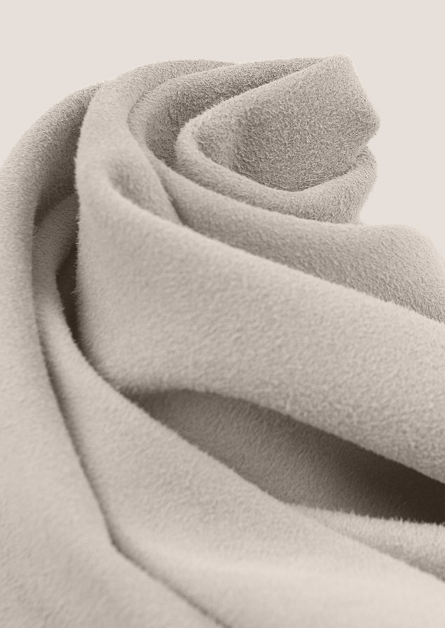 Nahaufnahme des Veloursleders in der Farbe Naturel.