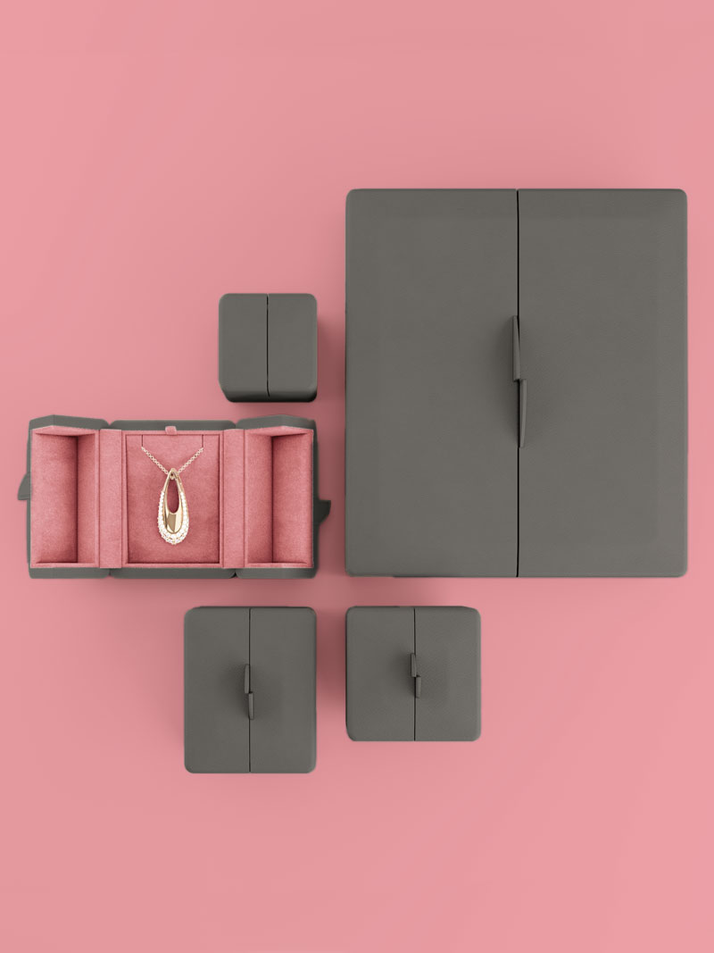 Arrangement de quatre tailles d'étuis Fleur de Luxe en Grey-Brown Rosé-Fluo fermés de dessus